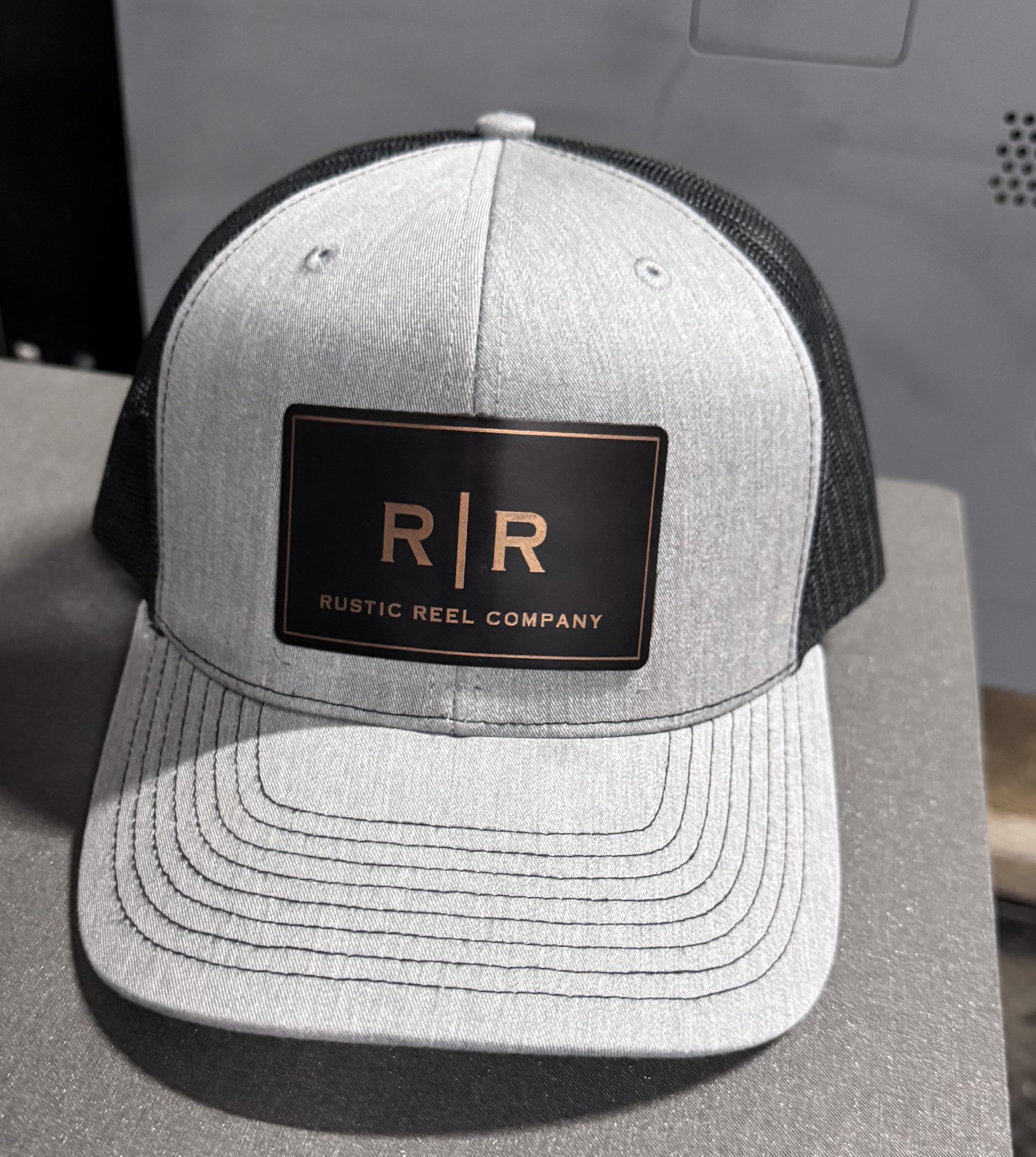 Rustic Reel Rectangle Logo Hat